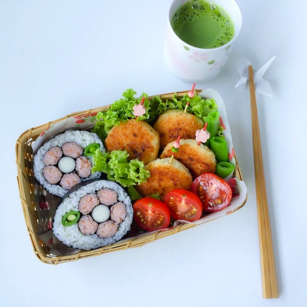 Slice the sushi into four pieces and pack them into your bento box with your favourite side dishes such as croquettes and tomatoes. And there you have it - a flower deco sushi roll. u00e2u20acu201d TODAY pic