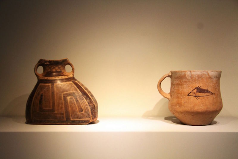 The oldest artefact at the Chinese Ceramics Gallery at the Asian Civilisations Museum is the cup with the fish design (right), which was made circa 5,000 to 4,500 BC. u00e2u20acu201d TODAY pic