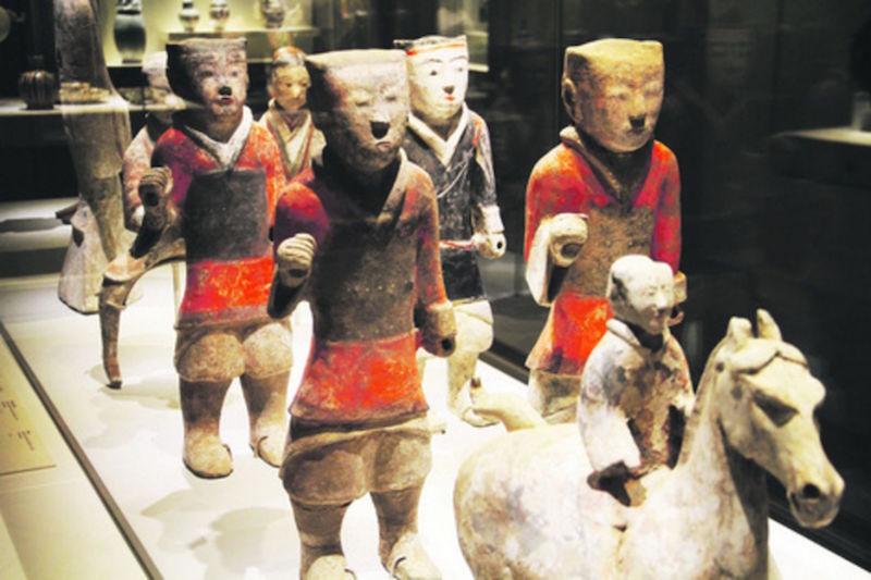 Pottery tomb figures from the Han Dynasty representing the court of a deceased ruler or official, at the Asian Civilisations Museum’s Chinese Ceramics. — TODAY pic