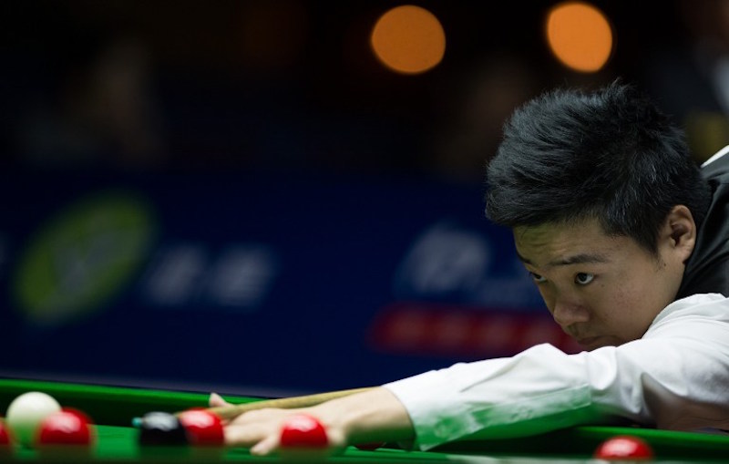 Chinau00e2u20acu2122s Ding Junhui plays a shot against Britainu00e2u20acu2122s Martin Gauld during the second round of the Snooker Shanghai Masters in Shanghai September 11, 2014. u00e2u20acu201d AFP pic
