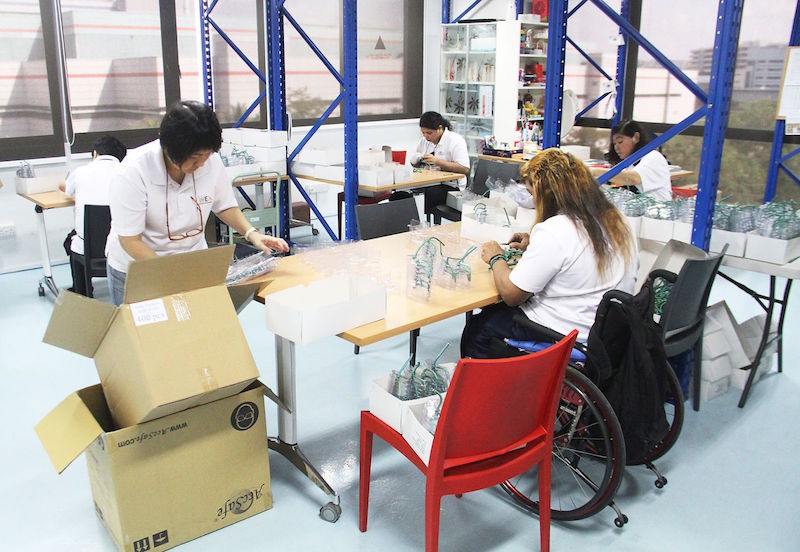 Physically disabled workers at work at Ark@Gambas, Gambas Crescent on May 6, 2016. u00e2u20acu201d TODAY pic