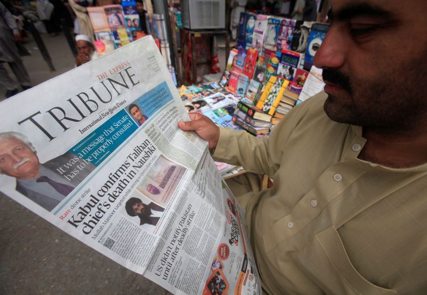 A man reads a newspaper containing news about Afghan Taliban leader Mullah Akhtar Mansour at a stall in Peshawar, Pakistan May 24, 2016. u00e2u20acu201d Reuters pic