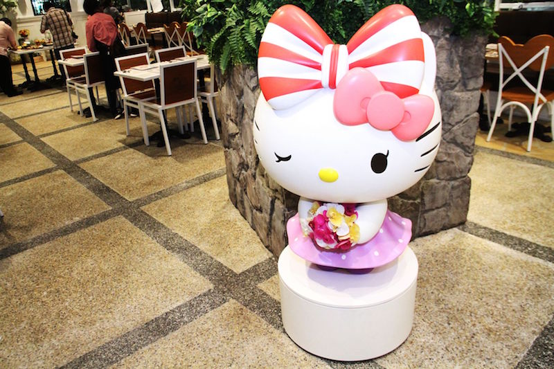 Hello Kitty Orchid Gardenu00e2u20acu2122s mascot winks at you as you enter the cafe. u00e2u20acu201d TODAY pic