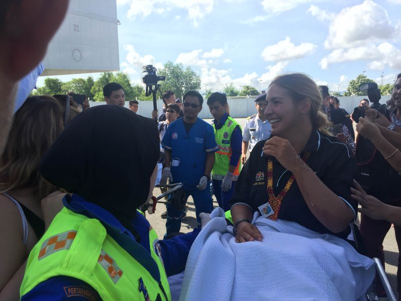 Spanish tourist Martha Miguel, 30, was smiling upon meeting family members at Kota Kinabalu International Airport after missing at sea for 10 days. ― Picture by Julia Chan