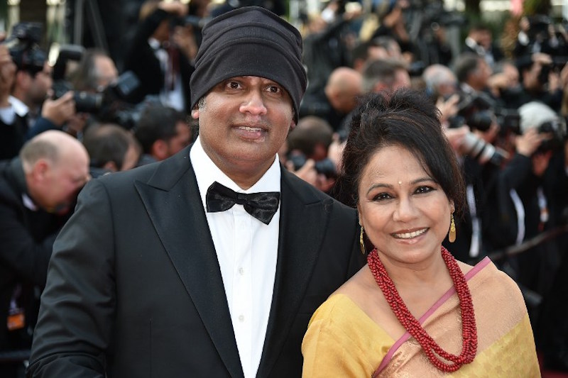 Singaporean director K. Rajagopal and Indian actress Seema Biswas pose as they arrive for the screening of the film u00e2u20acu02dcThe Unknown Girlu00e2u20acu2122 at the 69th Cannes Film Festival in Cannes May 18, 2016. u00e2u20acu201d AFP pic