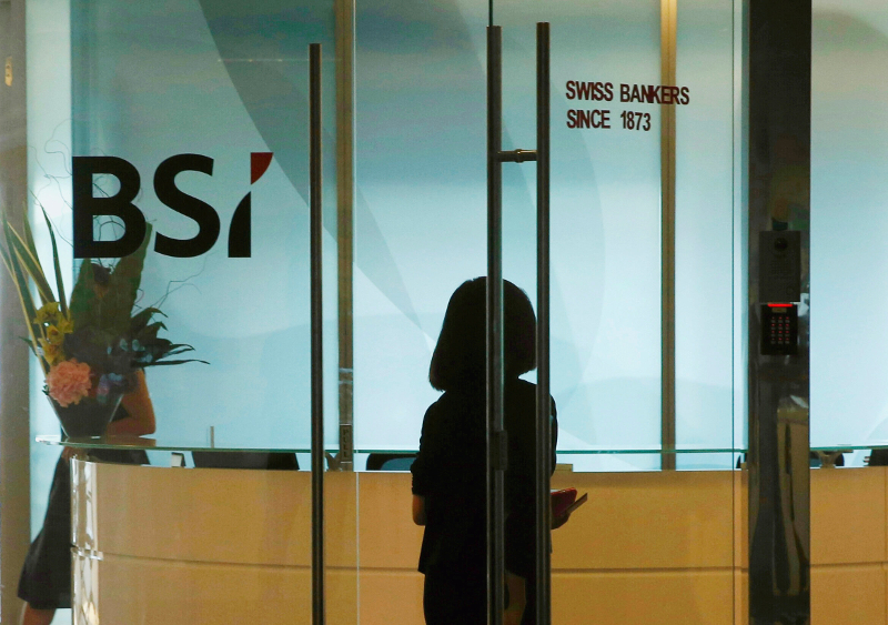 An employee enters the reception area of Swiss bank BSI's office in Singapore May 24, 2016. u00e2u20acu201d Reuters pic
