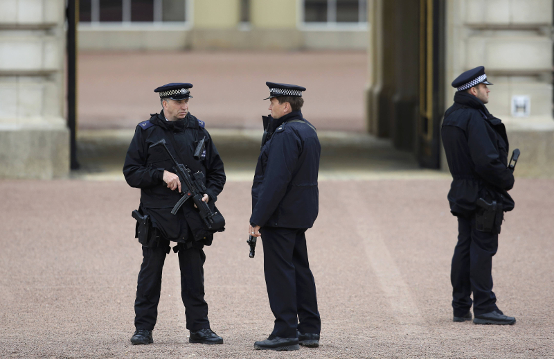 Armed police officers stand on duty at Buckingham Palace in London, Britain May 18, 2016. u00e2u20acu201d Reuters pic