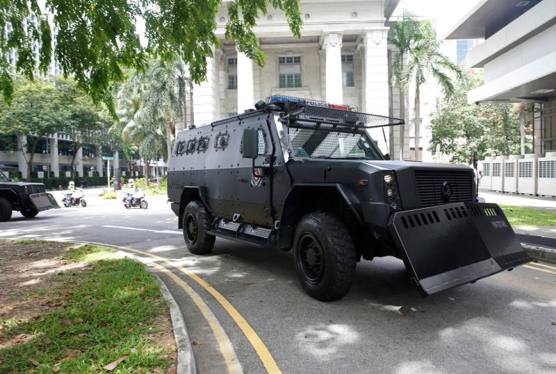 A convoy of armoured police vehicles carrying Bangladeshi workers, who were detained for planning attacks in their home country, arrives at the State Court in Singapore May 27, 2016. u00e2u20acu201d Reuters pic