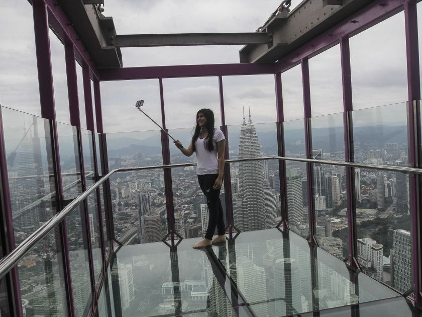 A tourist is pictured taking a selfie at Skybox, the latest attraction at the Kuala Lumpur Tower May 24, 2016. u00e2u20acu201d Picture by Yusof Mat Isa