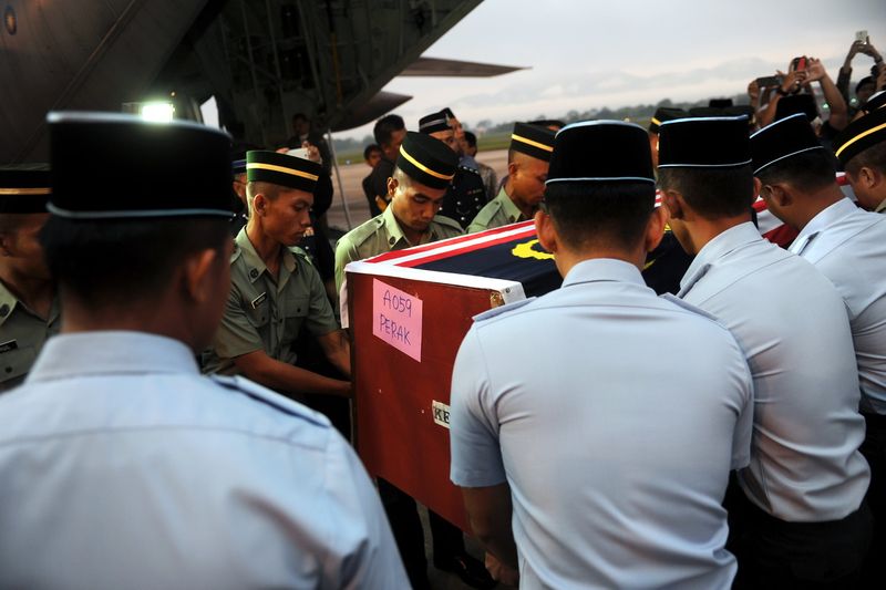 The remains of Kuala Kangsar MP Datuk Wan Khair-il Anuar Wan Ahmad arrived at the Sultan Azlan Shah Airport on a Hercules C130 on May 8, 2016. u00e2u20acu201d Bernama photo