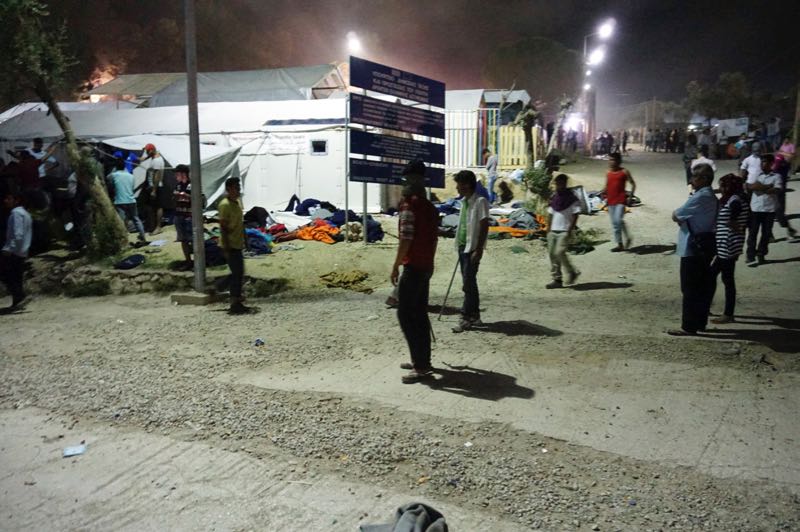 Migrants gather during overnight clashes between migrants at the Moria migrant detention camp on the island of Lesbos, early on June 2, 2016. u00e2u20acu201d AFP pic
