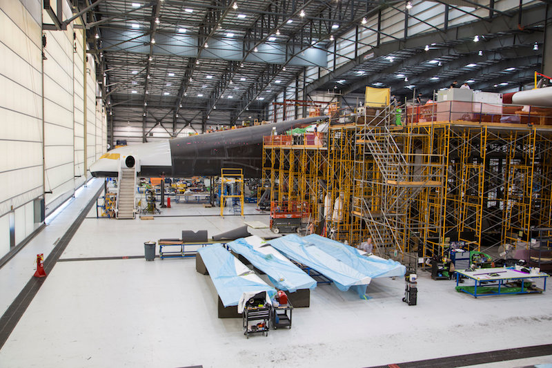 Vulcan Aerospaceu00e2u20acu2122s Stratolaunch rocketsu00e2u20acu2122 left fuselage assembly is shown under construction by Northrop Grumann Scaled Composites at the Mojave Air and Space Port in Mojave, California, in this handout photo released to Reuters June 19, 2016. 