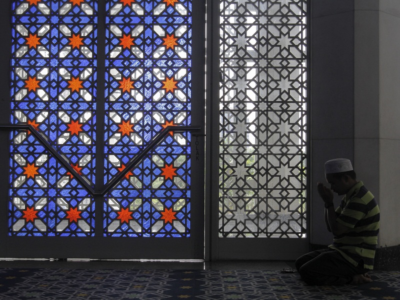 A man prays on the second day of the holy month of Ramadan at the Sultan Salahuddin Abdul Aziz Shah Mosque, in Shah Alam June 7, 2016. u00e2u20acu201d Picture by Reuters