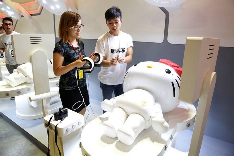 Visitors need to use a defibrillator to recharge Robot Kitty. u00e2u20acu201d TODAY pic