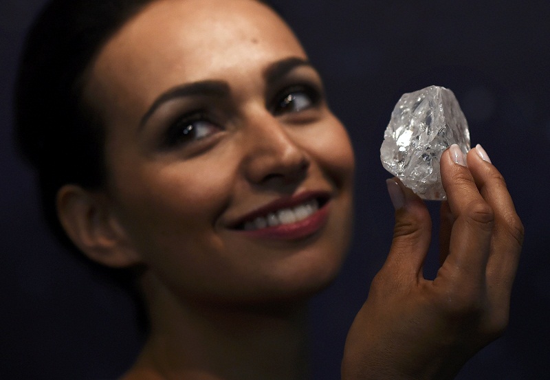 A model shows off the 1109 carat Lesedi la Rona, the largest gem quality rough diamond discovered in over 100 years during a sale preview at Sotheby’s auction house in London, Britain June 14, 2016. — Reuters pic