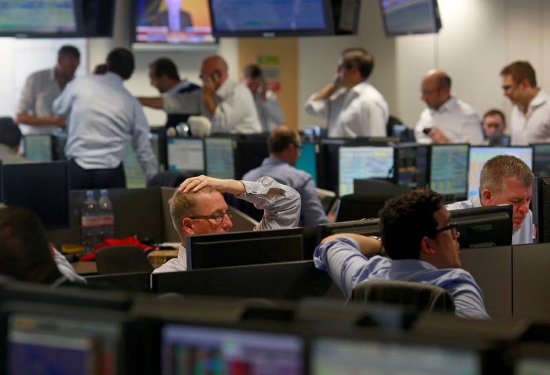 Traders from BGC, a global brokerage company in Londonu00e2u20acu2122s Canary Wharf financial centre react as European stock markets open early June 24, 2016 after Britain voted to leave the European Union in the EU BREXIT referendum. u00e2u20acu201d Reuters pic