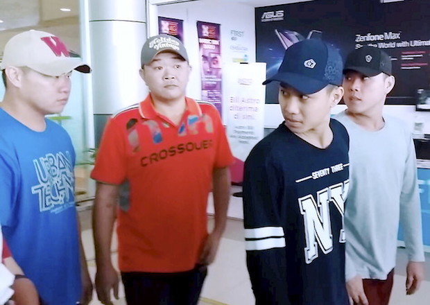 An image taken with a handphone camera shows freed Sarawakians Wong Teck Chii, Wong Hung Sing, Johnny Lau Jung Hien and Wong Teck Kang arriving at Sibu Airport from Kota Kinabalu June 14, 2016. u00e2u20acu201d Bernama pic