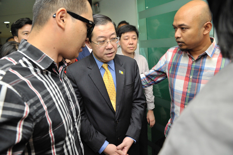 Penang Chief Minister Lim Guan Eng being taken away to MACC state headquarters, George Town, June 29, 2016. u00e2u20acu201d Picture by KE Ooi