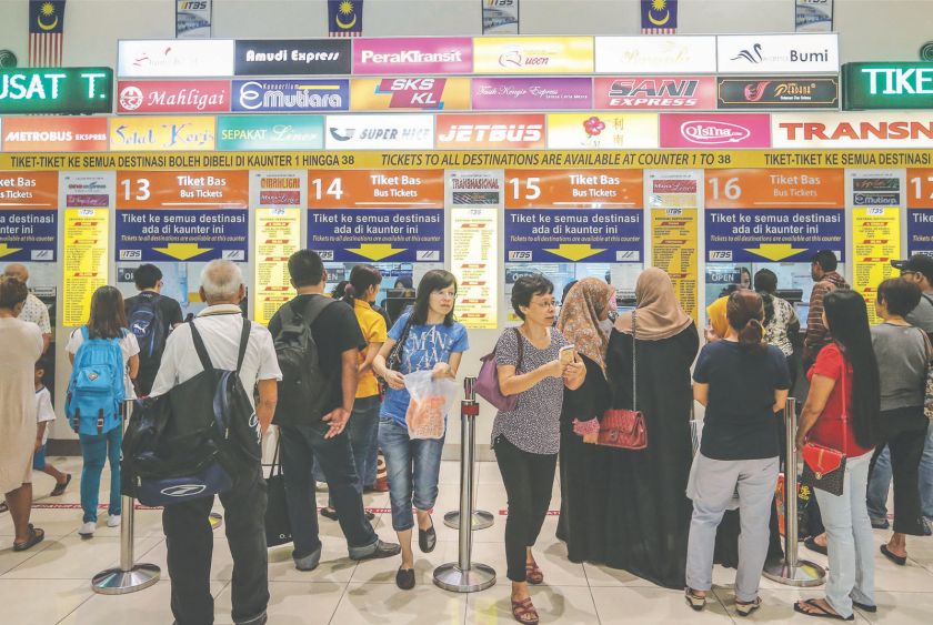 Huge crowds throng counters daily at the Terminal Bersepadu Selatan ahead of Hari Raya. u00e2u20acu201d Picture by Firdaus Latif