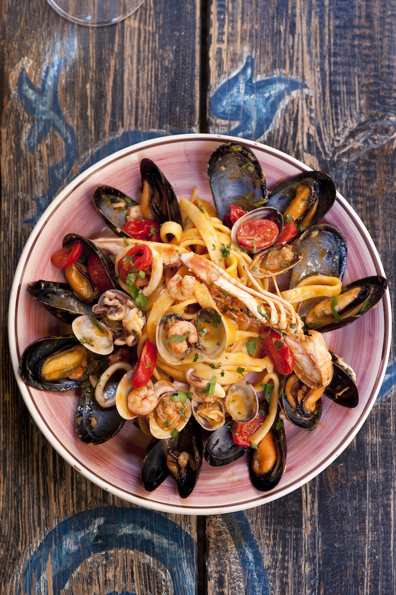 Fettuccine with mussels, clams, calamari and shrimp at Sicilia in Tavola, a restaurant in Syracuse, Italy, May 21, 2016. — Picture by Susan Wright/The New York Times