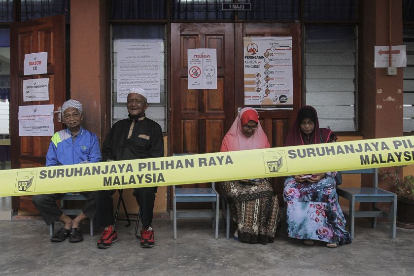 Voters queue up to vote outside a polling station in Sekolah Kebangsaan Sungai Limau, June 18, 2016. u00e2u20acu201d Picture by Yusof Mat Isa