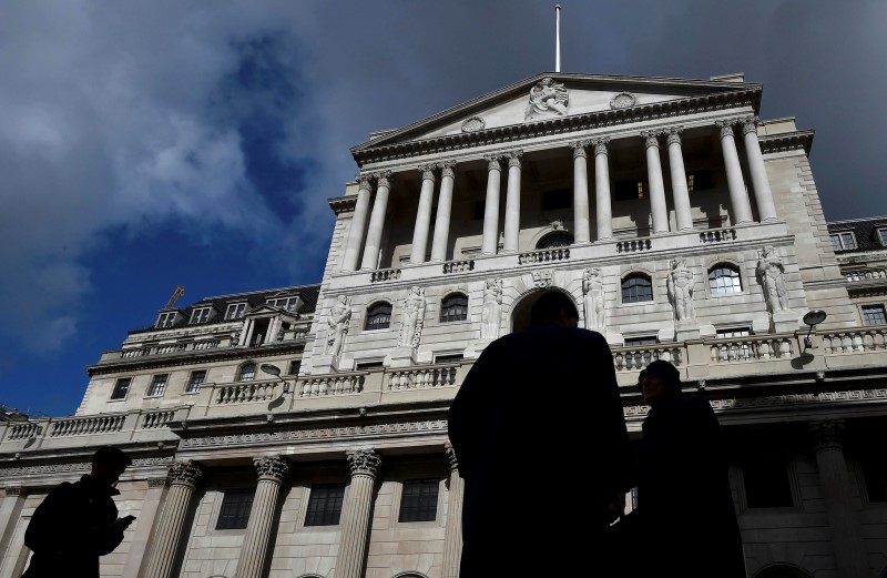 City workers walk past the Bank of England in the City of London, Britain, March 29, 2016. u00e2u20acu201d Reuters pic
