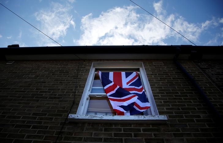 A British flag flutters in front of a window in London, Britain, June 24, 2016 after Britain voted to leave the European Union in the EU BREXIT referendum. u00e2u20acu201d Reuters pic