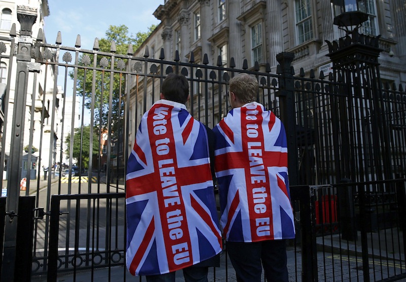 Vote leave supporters wear Union flags, following the result of the EU referendum, outside Downing Street in London, Britain June 24, 2016. u00e2u20acu201d Reuters pic