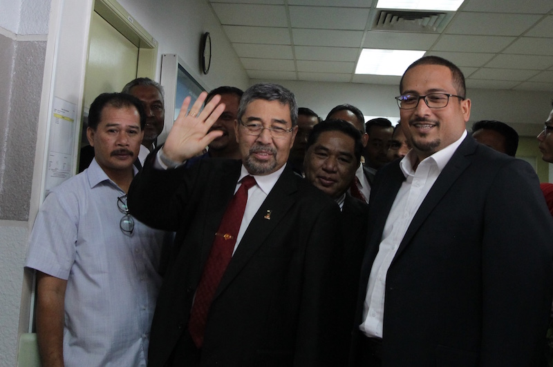 Ahmad Bashah waves to reporters after the exco meeting in the Penang Hospital in George Town June 22, 2016. u00e2u20acu201d Picture by KE Ooi