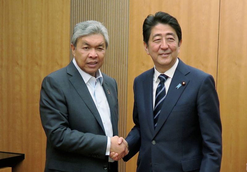 Datuk Seri Dr Ahmad Zahid Hamidi (left) held a brief meeting with Japanese Prime Minister Shinzo Abe at the Prime Minister's office in Nagatacho, May 31, 2016. u00e2u20acu2022 Bernama picn
