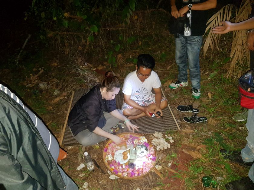 The Borneo Paranormal group presents offerings to ghosts in the hopes of appeasing them to appear on camera. — Picture courtesy of Sabah Underground Paranormal.