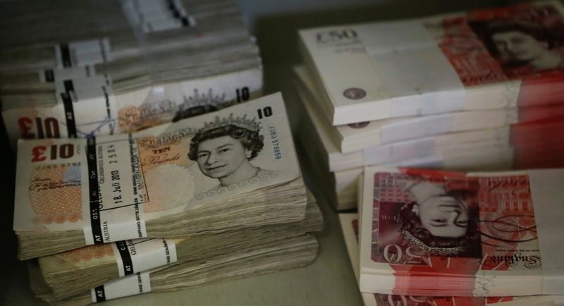 Wads of British pound banknotes are stacked in piles at the GSA Austria company's headquarters in Vienna July 22, 2013. u00e2u20acu201d Reuters pic