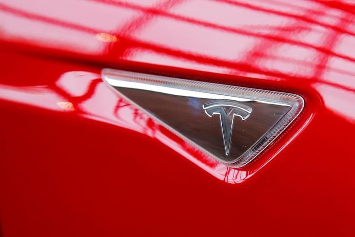 A Tesla logo on a Model S is photographed inside of a Tesla dealership in New York, US, April 29, 2016. REUTERS/Lucas Jackson