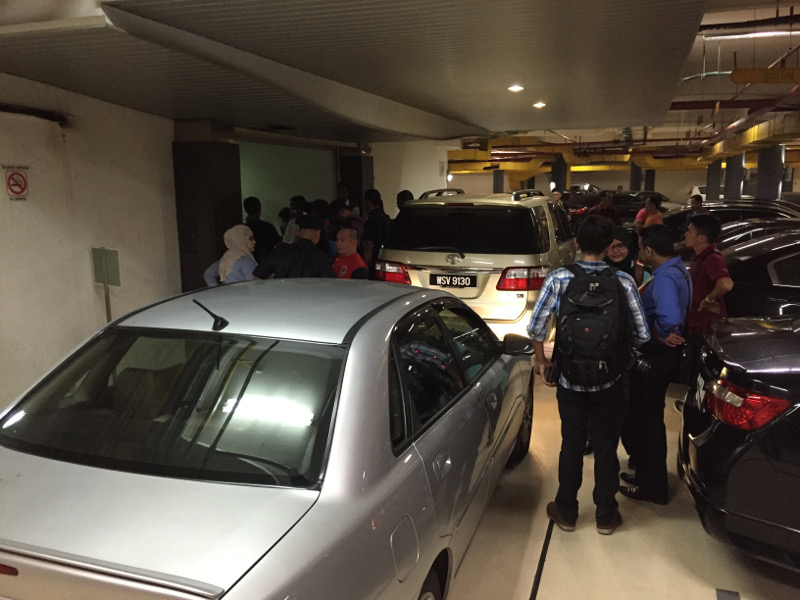 MACC vehicles and police personnel are seen waiting at the entrance to the office of Penang Chief Minister Lim Guan Eng at Komtar, George Town, Penang, June 29, 2016. u00e2u20acu201d Picture by KE Ooi