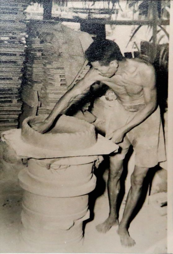 A worker making an agricultural pipe at the GBH kiln in the 1940s. 
