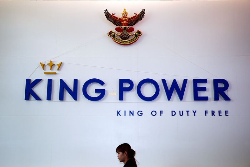 A woman walks past the King power logo at its headquarters in Bangkok June 14, 2016. u00e2u20acu201d AFP pic