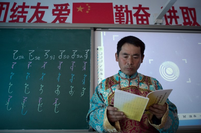 Schoolteacher Shi Junguang during a class at the Sanjiazi Manchu school in Sanjiazi village, Heilongjiang province, May 4, 2016. u00e2u20acu201d AFP pic