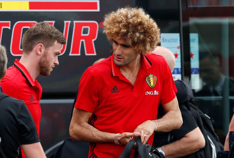Marouane Fellaini boards a plane bound for Euro 2016 in France with the Belgium national squad at the Zaventem airport June 7, 2016. u00e2u20acu201d Reuters pic 