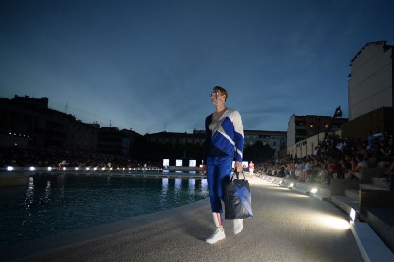 A model presents a creation from Dirk Bikkembergs. — AFP pic 