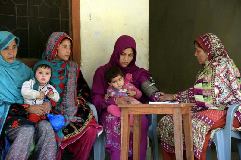 Pakistani health worker Zeweer Jan (right) speaks with pregnant Kashmiri women at a healthcare centre in the town of Sharda in the mountainous Neelum Valley in this photograph taken May 27, 2016. u00e2u20acu201d AFP pic
