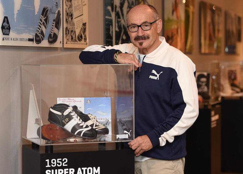Helmut Fischer, former employee and archivist of the German sports goods company Puma, poses with historical Puma articles, pictured at the headquarters of Puma in Herzogenaurach, southern Germany, on June 3, 2016. u00e2u20acu201d AFP pic