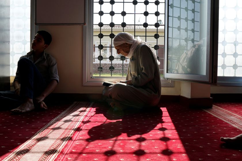 A Syrian man reads the Quran after a mass prayer session during the Muslim holy fasting month of Ramadan at the Harran refugee camp in Sanliurfa province, Turkey June 7, 2016. u00e2u20acu201d Reuters pic