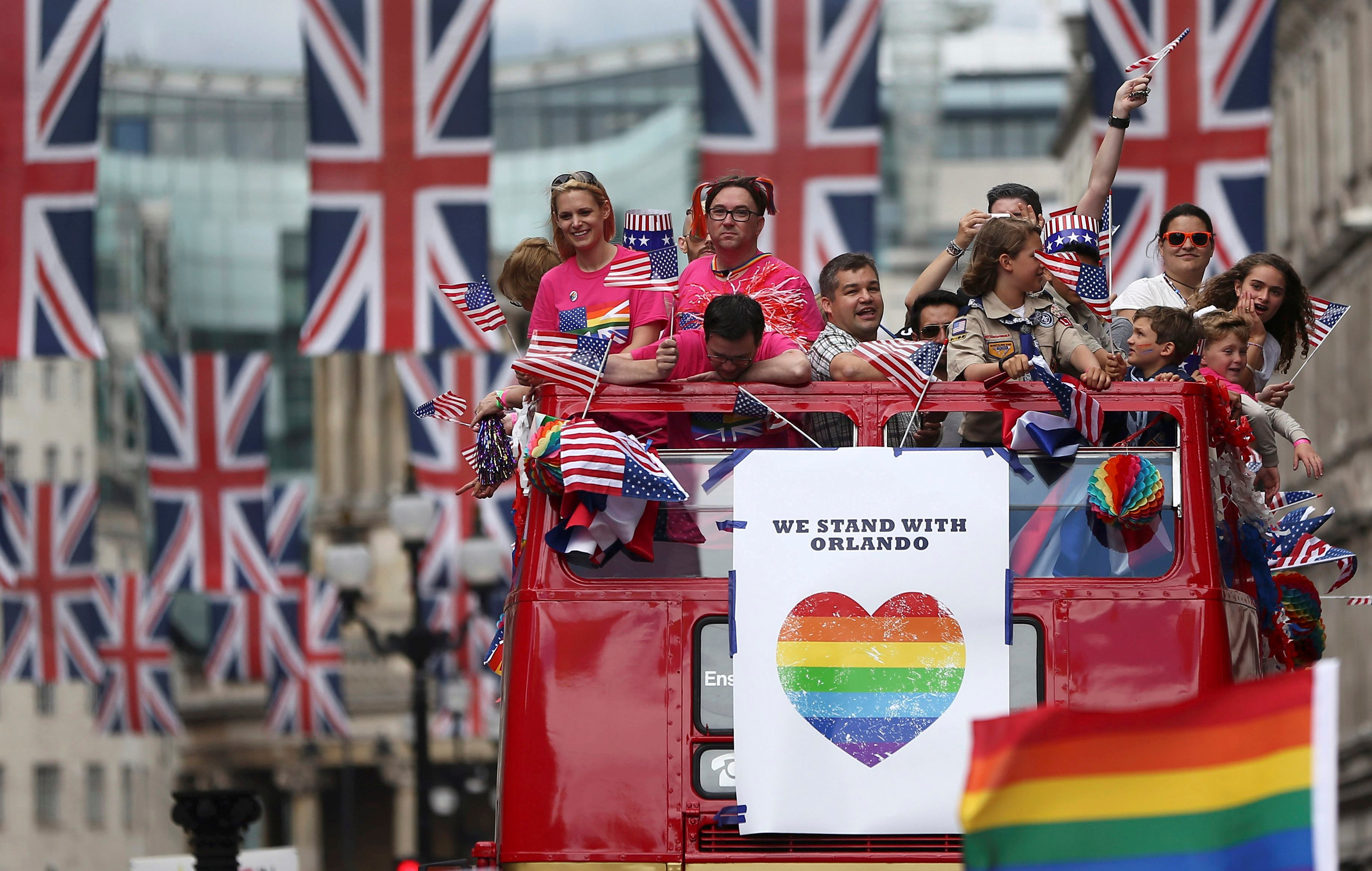 People pay tribute to the victims of the Orlando nightclub shooting as they take part in the annual Pride London Parade which highlights issues of the gay, lesbian and transgender community, in London, Britain June 25, 2016. u00e2u20acu201d Reuters pic