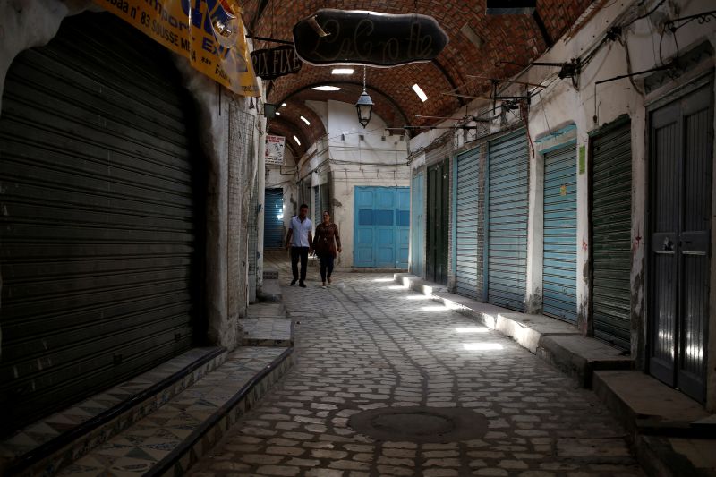People walk past closed shops in the old city of Sousse, Tunisia June 24, 2016. — Reuters pic
