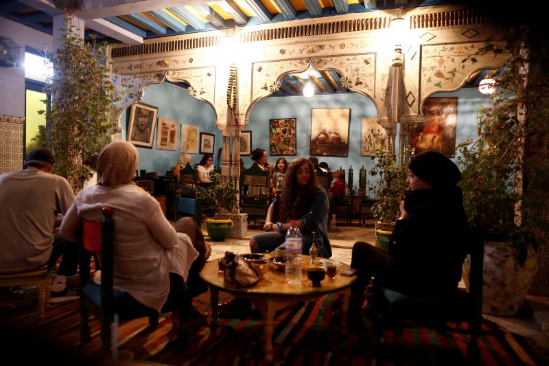 Tunisians are seen at Dar Al Kamr restaurant during Iftar time at the old city of Sousse, Tunisia June 23, 2016. — Reuters pic