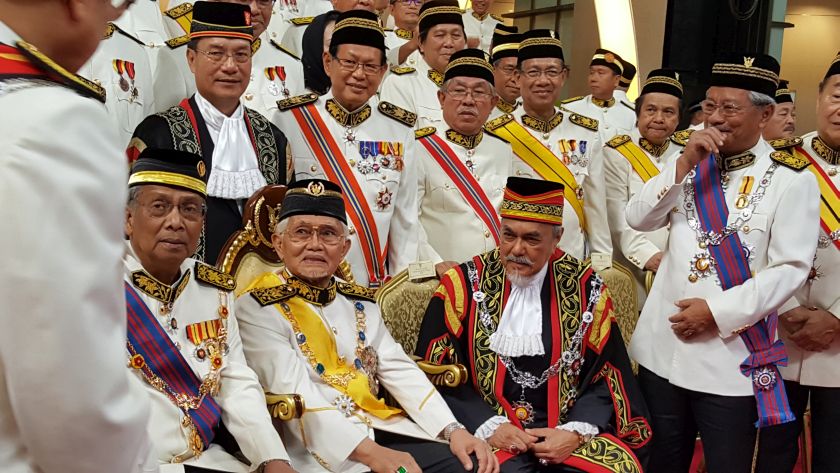 Sarawak Governor Tun Abdul Taib Mahmud (seated, centre) is seen having a conversation with State Ministers after a group photograph during the Sarawak State Assemblyu00e2u20acu2122s opening ceremony.  u00e2u20acu201d Picture by Sulok Tawie