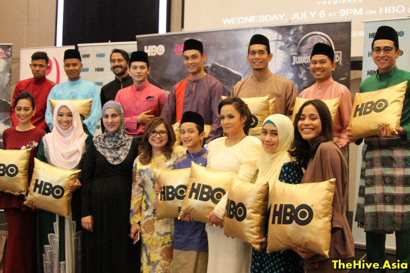 The cast of voice talents involved in the Malay-dubbed version of u00e2u20acu02dcJurassic Worldu00e2u20acu2122 pose for a picture with HBO cushions in Kuala Lumpur. u00e2u20acu201d Picture by TheHive.Asia