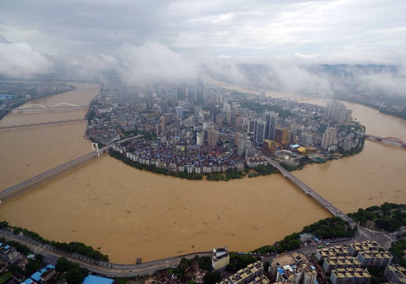 A general view shows the swollen Liujiang River in Liuzhou, south Chinau00e2u20acu2122s Guangxi Zhuang Autonomous Region on July 5, 2016. u00e2u20acu2022 AFP pic