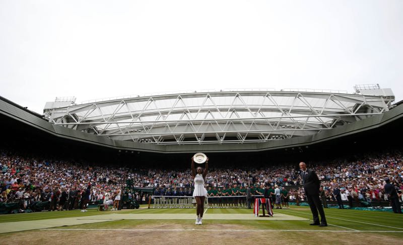 USAu00e2u20acu2122s Serena Williams celebrates winning her womenu00e2u20acu2122s singles final match against Germanyu00e2u20acu2122s Angelique Kerber with the trophy at the All England Lawn Tennis & Croquet Club in Wimbledon, England on July 9, 2016. u00e2u20acu201d Reuters pic