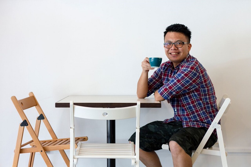 Michael Tan, cheerful barista and founder of Alpha Brew Coffee. u00e2u20acu201d Picture by CK Lim